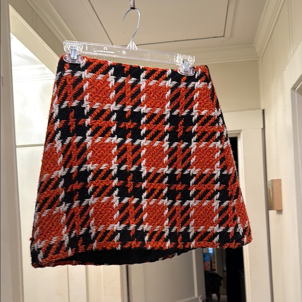 Raoul A-Line Skirt in Orange, Black, and White wool Houndstooth